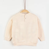 חולצת פוטר עם פונפונים - שמנת