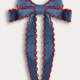 סיכת פפיון בסיומת גלים - כחול