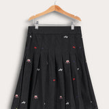 חצאית קפלים מדוגמת - שחור ג'ינס