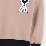 חולצת קולור בלוק - בז'