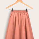 חצאית כיווצים עם כיסים - כתום