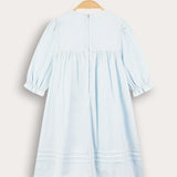 שמלת כיווצים בסיומת גלים - תכלת